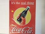 It's the real thing Drink Coca-Cola